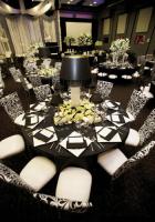 Chairs with Flair
Ruching, gold, sating and suede, oh my!  Since your guests may spend half their time at your event sitting, treat them to "chair flair," including specialty fabrics, dramatic colors and extravagant adornments such as ruffles, feathers and Swarovski crystals.