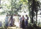 Meher Baba with a group of his community along the lake. (From left) Adele Wolkin, Filis Frederick, Mani S. Irani (Meher Baba’s sister), Sparkie Lukes, Murshida Ivy Duce, Meher Baba, Mehera J. Irani, Delia DeLeon and Meheru Irani with a pet bunny.