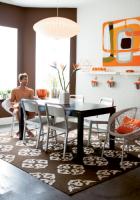 Adam Roberts’s designer (and sister), Angel Roberts, says the kitchen fixtures and furniture had to be sturdy and functional for Adam and his athletic guests. With frequent traffic of wet, sandy volleyball players, the dining chairs and concrete floors can actually be hosed off.                                                                                                                